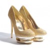 Gold high heel shoes