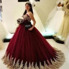 Burgundy and gold quinceanera dresses